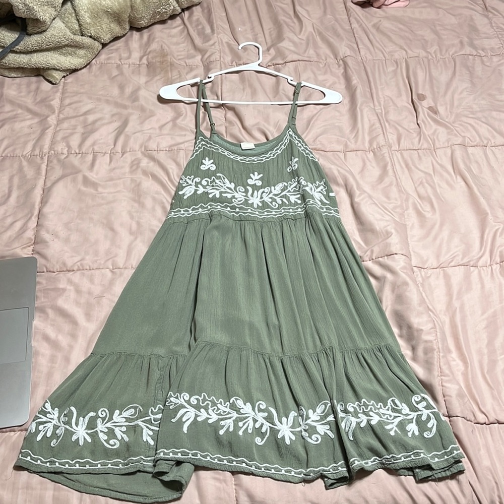 Olive green with white stitching accent